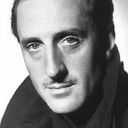 Basil Rathbone als Andre Trochard