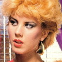 Roxanne Rollan als Radio Show Host (segment "Ask Bon Bon")