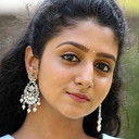 Arsha Baiju als Meenakshi Jayaraj