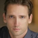 Mark Deakins als (voice)