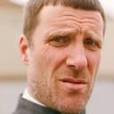 Jason Williamson als The Poacher