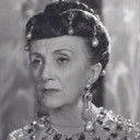 Colette Régis als La logeuse de Gilbert