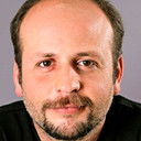 Celal Acaralp als Pharmacist Saim