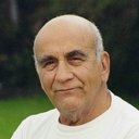 Warren Mitchell als Reg Lilburn