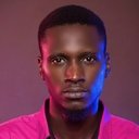 Riyo David als Warri