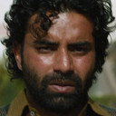 Navdeep Singh als Faraj Courier