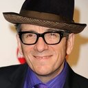 Elvis Costello als Self - Interviewee