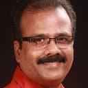 Sivakumar als Dr. Abu Bakkar (segment "Pandhayam")