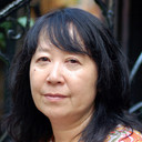 Ikue Mori als (voice)