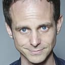 Ryan Blakely als Harkness Client