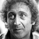 Gene Wilder als George / Skip Donahue (archive footage)