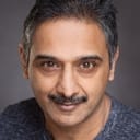 Ash Patel als Middle Aged Asian Man