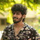 Kishore als Thadchanamoorthy (Thachi)