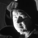 Aleksey Frolov als the man in black