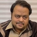 Lokesh Mittal als Broker Tandon