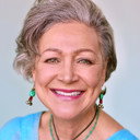 Helen Minassian als British News Presenter