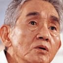Masami Shimojō als Yakuza Chairman