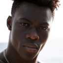 Emmanuel Elozieuwa als Kosmas