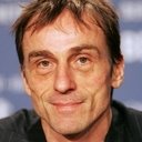 André Hennicke als Direktor