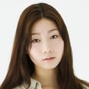 土居志央梨 als Rumi
