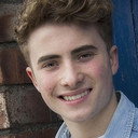 Bretten Lord als Tom Proctor