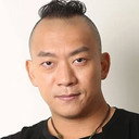 Oscar Ka Li als Roadblock Policeman