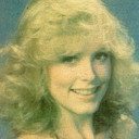 April Clough als Angie Crawford