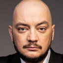 Роман Юнусов als Okhrannik (voice)