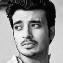 John Bhattacharya als Uday Mukherjee