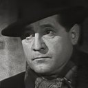 Henri Charrett als L'inspecteur de la brigade mondaine (uncredited)
