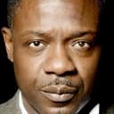 Nicholas Beveney als Black Man Airport