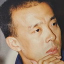 Qiu Xiaoguang als 