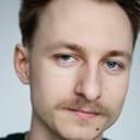 Oskar Jarzombek als Bank Worker Boguś