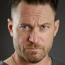 Adam T Perkins als Corrections Officer Smith