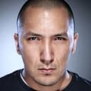 Trevor Carroll als Detective Denman