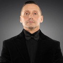 George Menenzes als The Personal Concierge