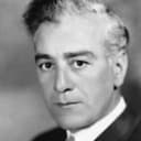 Al Ernest Garcia als His Butler