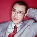 Mark Lamarr als Irch Bishop