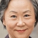 MeeWha Alana Lee als Restaurant Owner's Wife