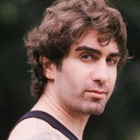 Aldo Razmjoo als Corman