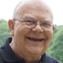 John Philip Kavcak als Priest at Funeral