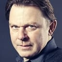 Szymon Kuśmider als (voice)