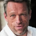 Brian Thompson als Clint Jensen