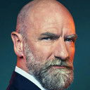 Graham McTavish als Head Marshall Warren