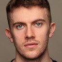 Finn Haney als TJ