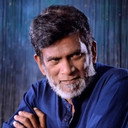 Sarath Kulanga als The one-Earless person who put up the posters