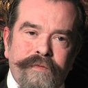 Joe Coleman als Professor Mambuzu