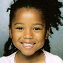 Milan Howard als Kelly Cooper