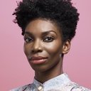 Michaela Coel als Resistance Monitor