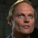 Christopher Neame als Charles Patrick